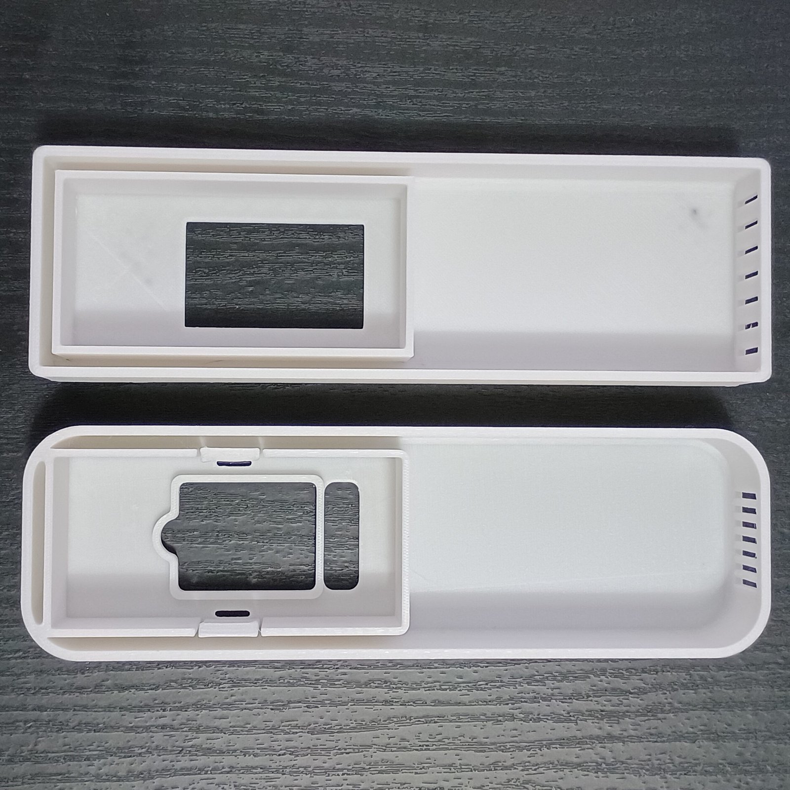 Interior view of two PETG covers showing the retention geometry.
